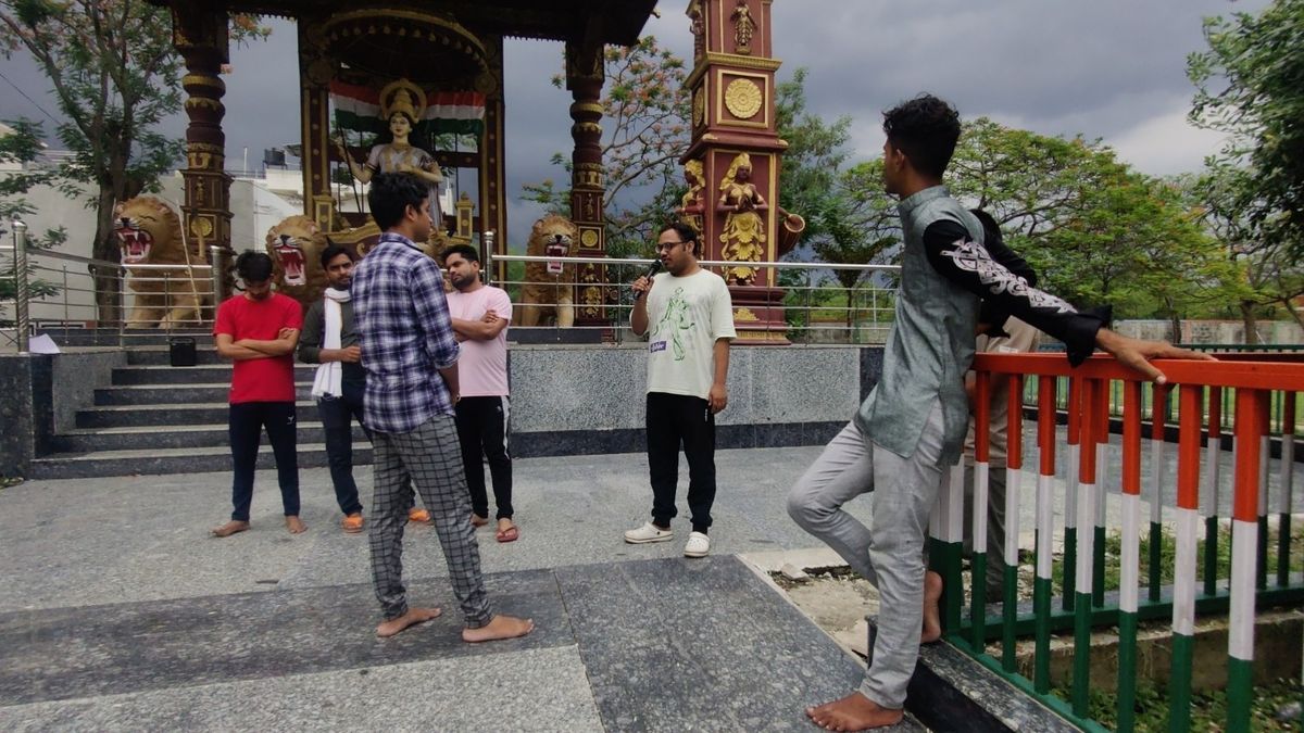 Public speaking practice at a city landmark